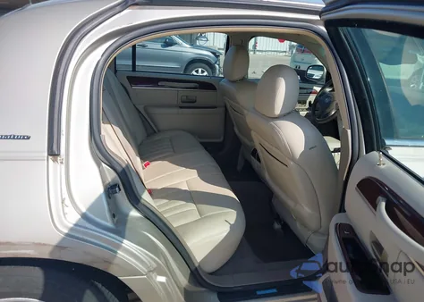 2004 Lincoln Town Car Signature из США, поврежденный, VIN 1LNHM81W44Y617901